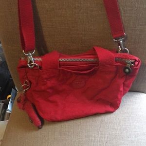 Kipling red hand or shoulder bag